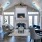Lobby area with room for lounging on couches and a TV