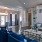 Lobby area with room for lounging on couches and a TV