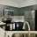 kitchen area on wooden floor with spacious counter-space and designer appliances